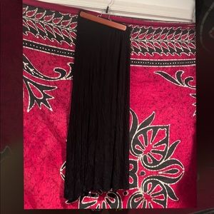 Cotton black long skirt with slit.